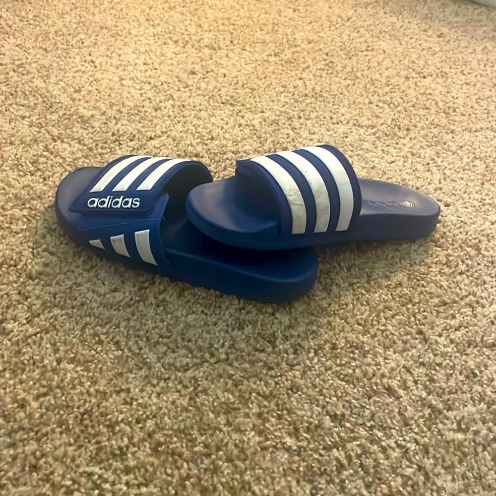 these are blue adidas that have been worn only a couple times and are not rough.